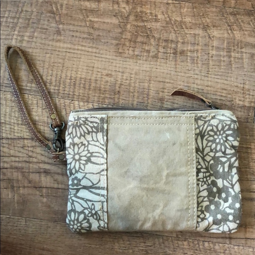 The Sak brown floral wristlet